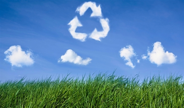 Recycle sign in clouds